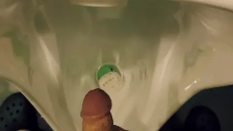 Guy Ejaculates in Urinal