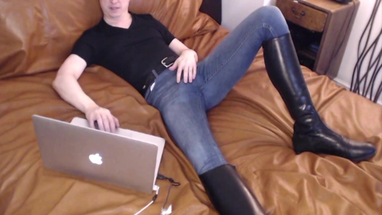 Guy Cums in Jeans Watching Porn on Leather Bed