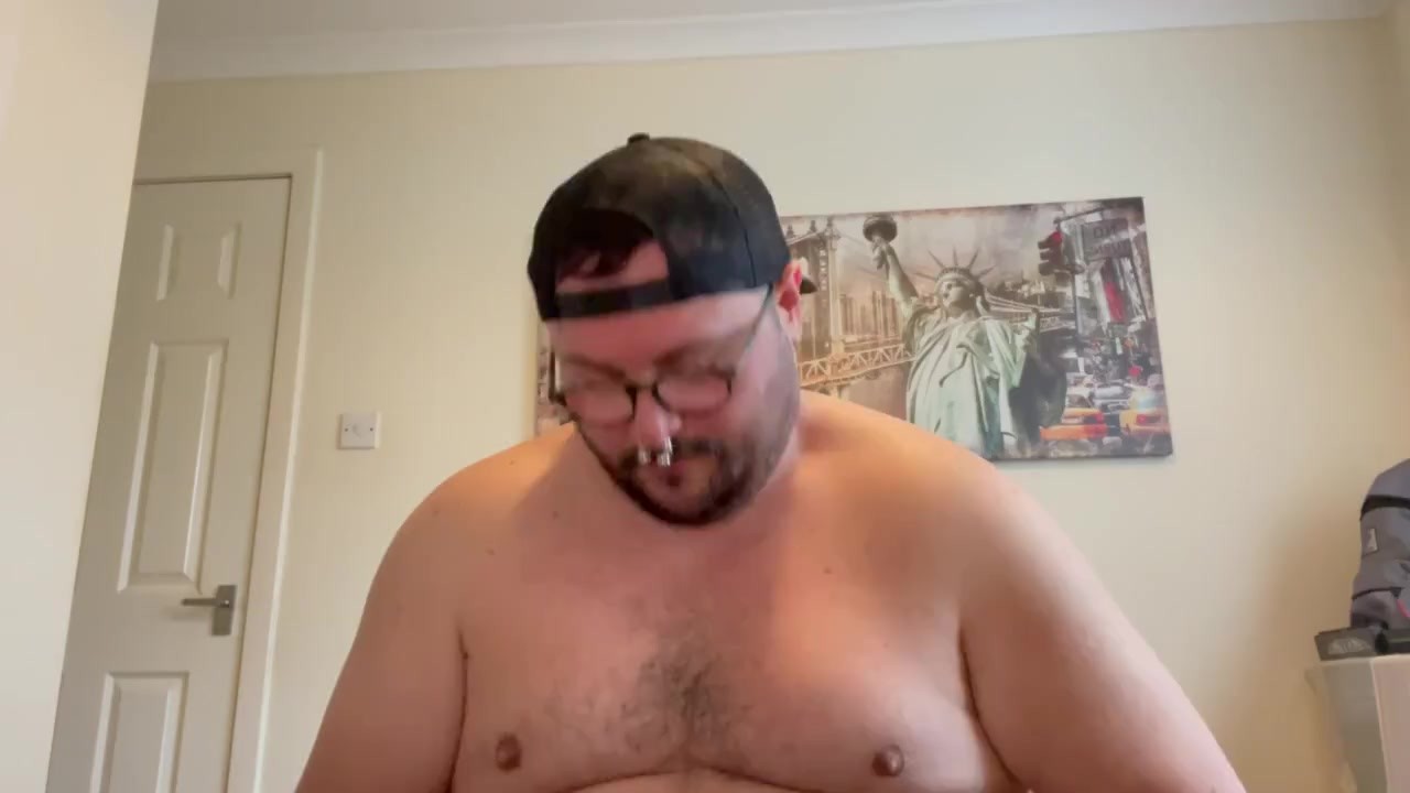 Hunky Guy Smokes Cigar While Jerking Off to Big Cumshot