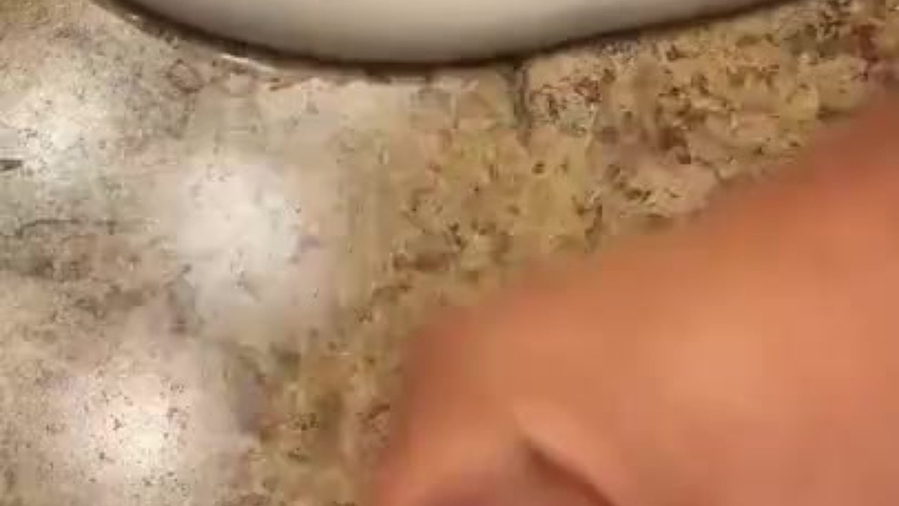 Housekeeper Cumming in Hotel Room