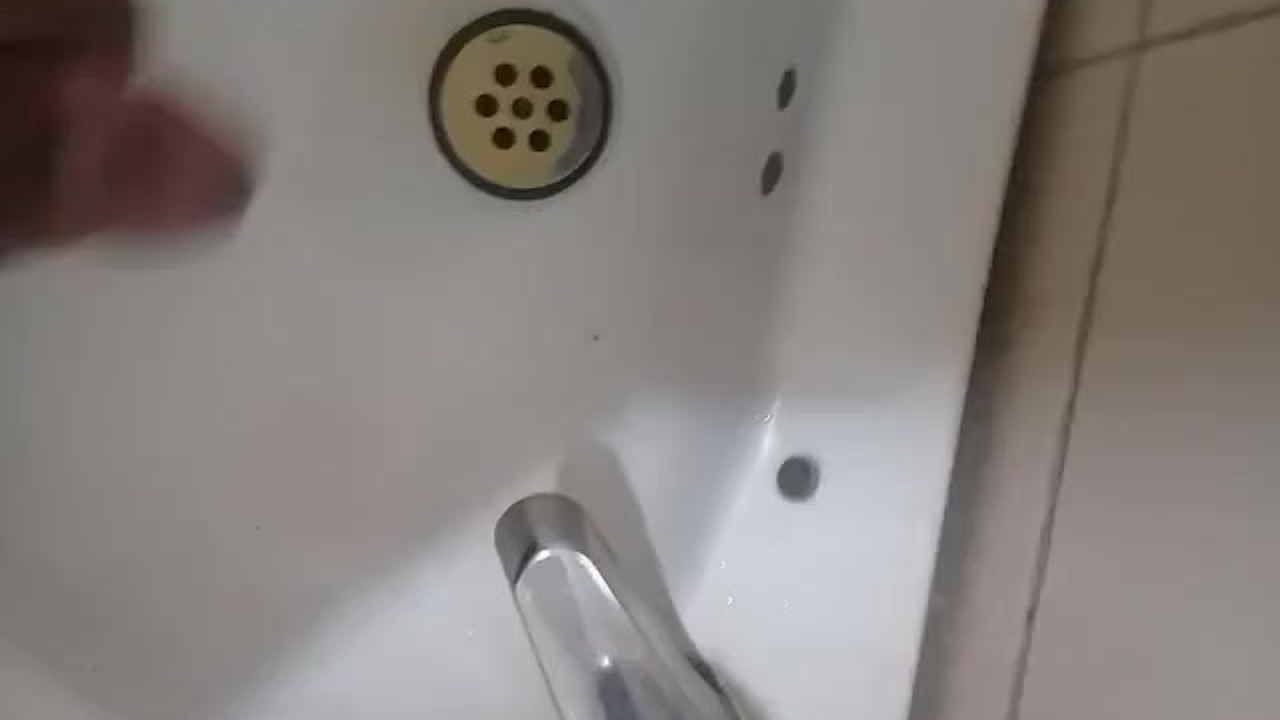 Gay Blowjob in Bathroom