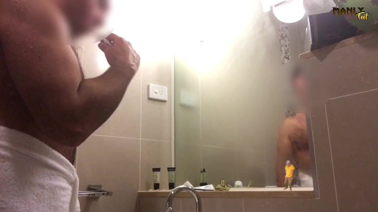 Giant Dominates Micro Human in Bathroom