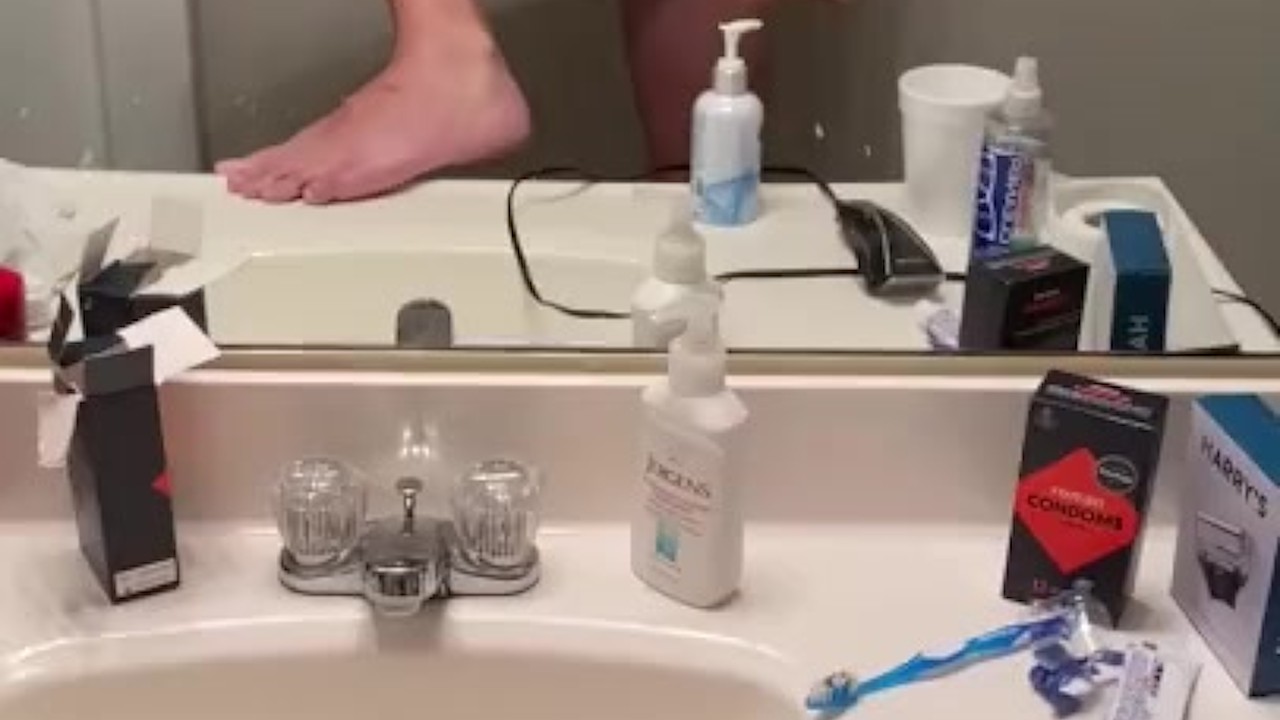 Guy Prepares for Shower with Huge Dildo Play
