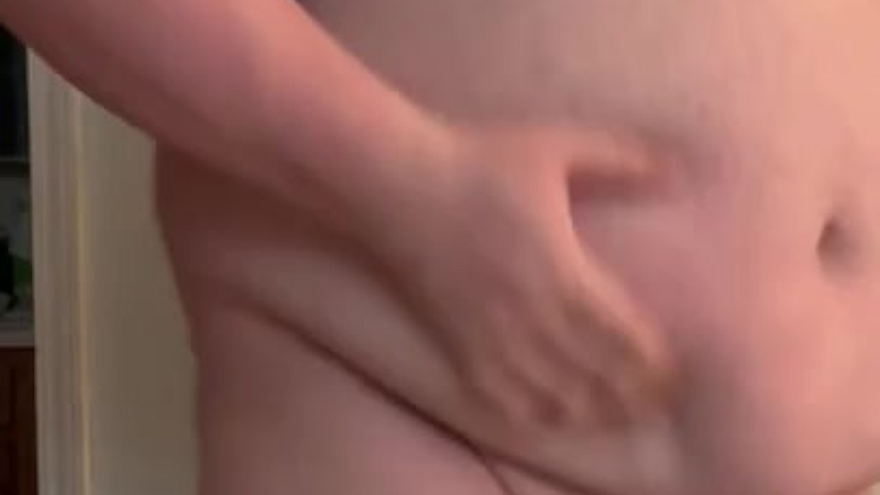 Model Shows Off Stretchy Shirt in Fashion Tease