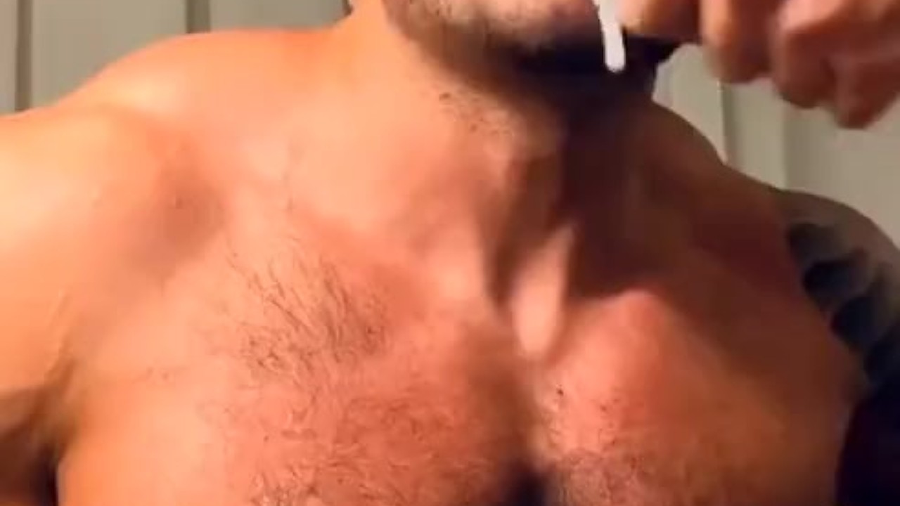 Muscle Man Takes Vitamins to Stay Strong