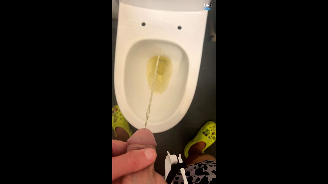Daddy Watches as Submissive Guy Urinates in Toilet
