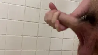 Big Cock Guy Releases Cum in Public Bathroom
